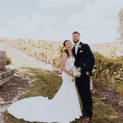 Kayla Wade and Dean Wade posing for a photo shoot during their wedding ceremony.